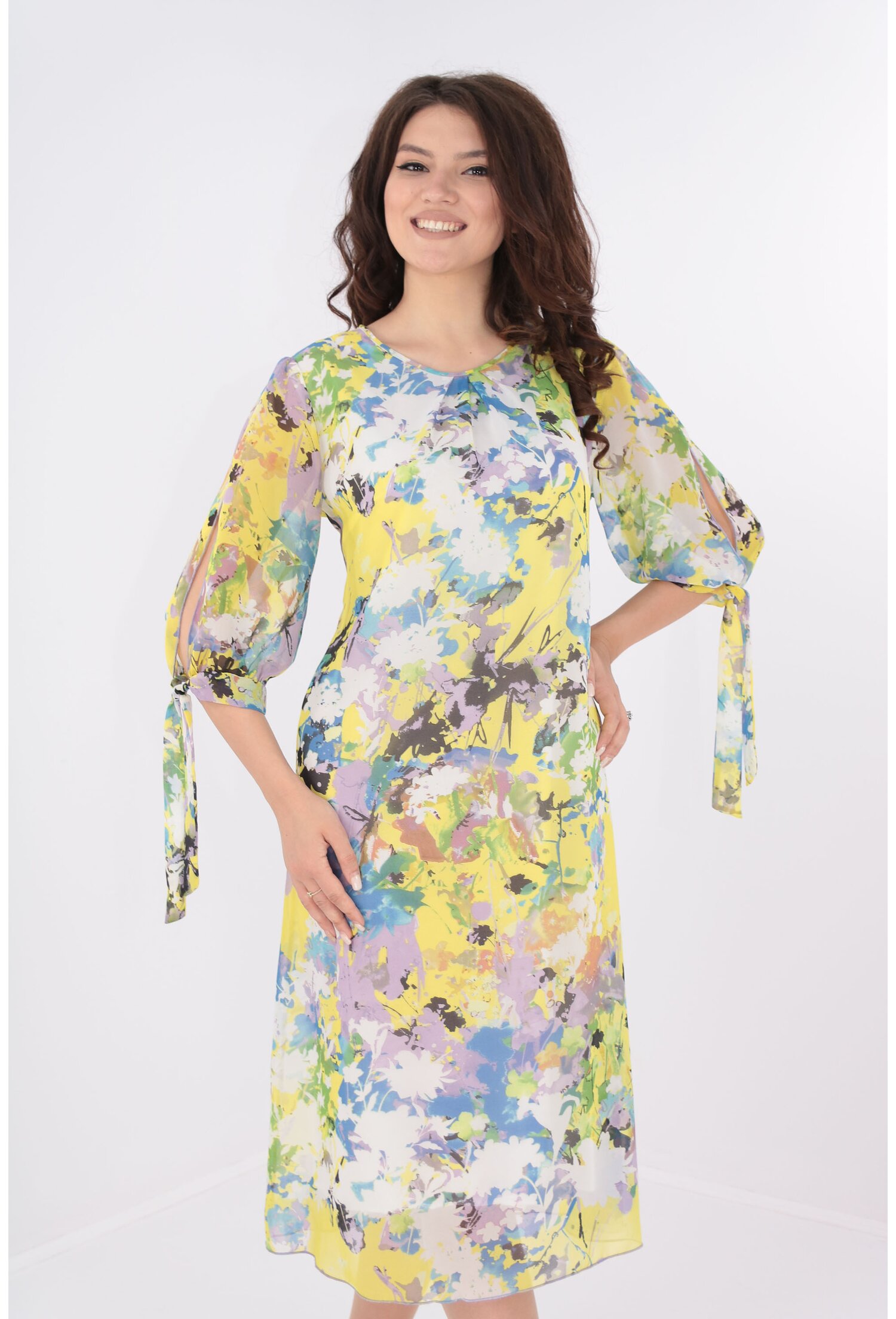 Rochie vaporoasa din voal galben cu print floral